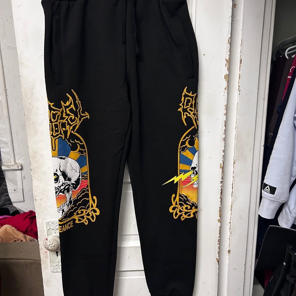 Rebel Vengeance: A Black Graphic Men's Joggers